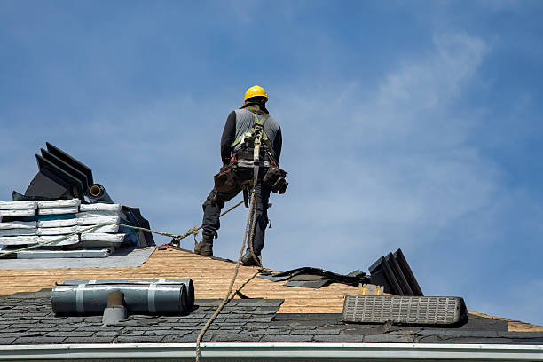 Professional Roof Replacement technician working in Taberg, NY